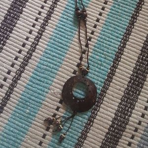 Indonesian hand-carved coconut shell necklace